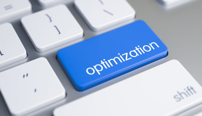 blue optimization key on white computer keyboard system optimizers